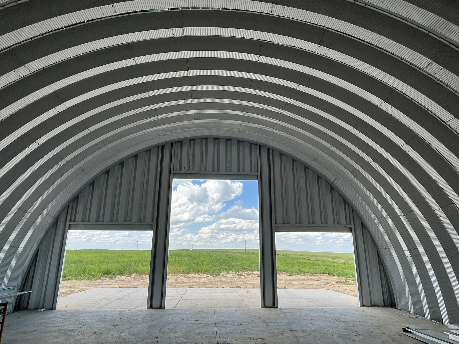 Arch interior with three garage doors